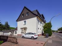 Wohnimmobilie Kauf Einfamilienhaus Einfamilienhaus mit Einliegerwohnung - kurze Wege in die Stadt garantiert!