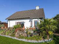 Wohnimmobilie Kauf Einfamilienhaus Gemütliches Einfamilienhaus mit liebevoll angelegtem Garten!
