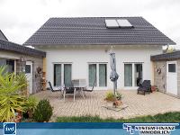 Wohnimmobilie Kauf Einfamilienhaus Mechernich-Obergartzem: Neuwertig, freistehend und mit 2 Garagen!