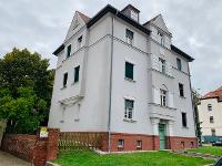 Wohnimmobilie Kauf Erdgeschosswohnung gemütliche Zwei-Raum-Wohnung mit Tageslichtbad, Loggia und Parkett