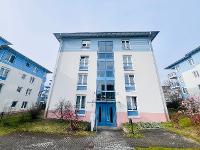 Wohnimmobilie Kauf Etagenwohnung Helle Drei-Raum-Wohnung mit Balkon, Gäste-WC, Aufzug & 2 Tiefgaragenstellplätzen im Südwesten von Leipzig
