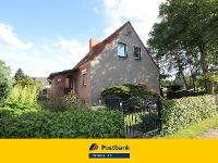 Wohnimmobilie Kauf Einfamilienhaus Bezugsfreies Einfamilienhaus im Grünen mit Baulandreserve - weiteres Haus möglich!