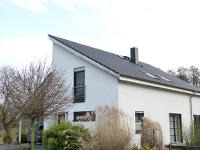 Wohnimmobilie Kauf Einfamilienhaus Jung und Modern für die Familie
