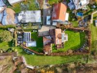Wohnimmobilie Kauf Einfamilienhaus Nachhaltiges Holzhaus in hoher Qualität mit Pool & Sauna sowie zusätzlichem Baugrundstück