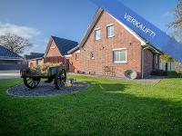 Wohnimmobilie Kauf Einfamilienhaus Schönes Einfamilienhaus mit modernem Komfort und großem Grundstück im Zentrum von Moordorf