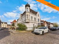 Wohnimmobilie Kauf Mehrfamilienhaus 3-Zimmer-Wohnung in charakteristischem Eckge